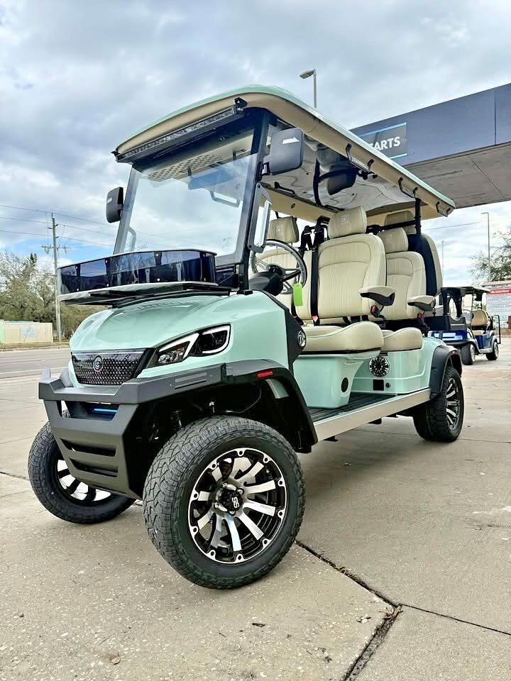 Conquest S60L six-passenger premium LSV golf cart.